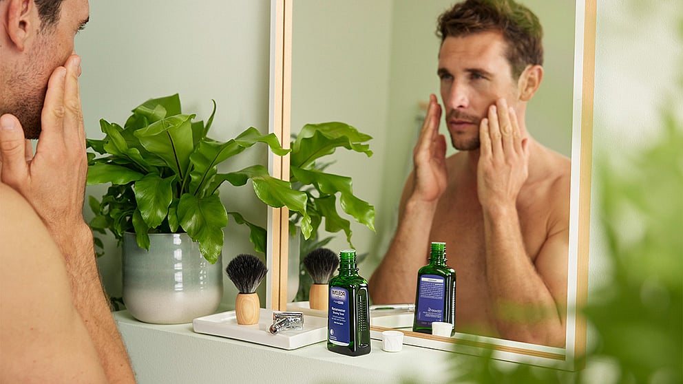 man using after shave