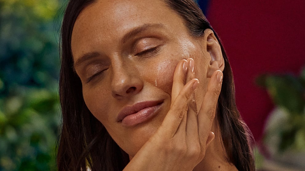 woman applying plumping night cream