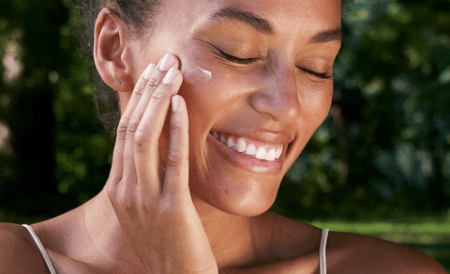 woman applying cream